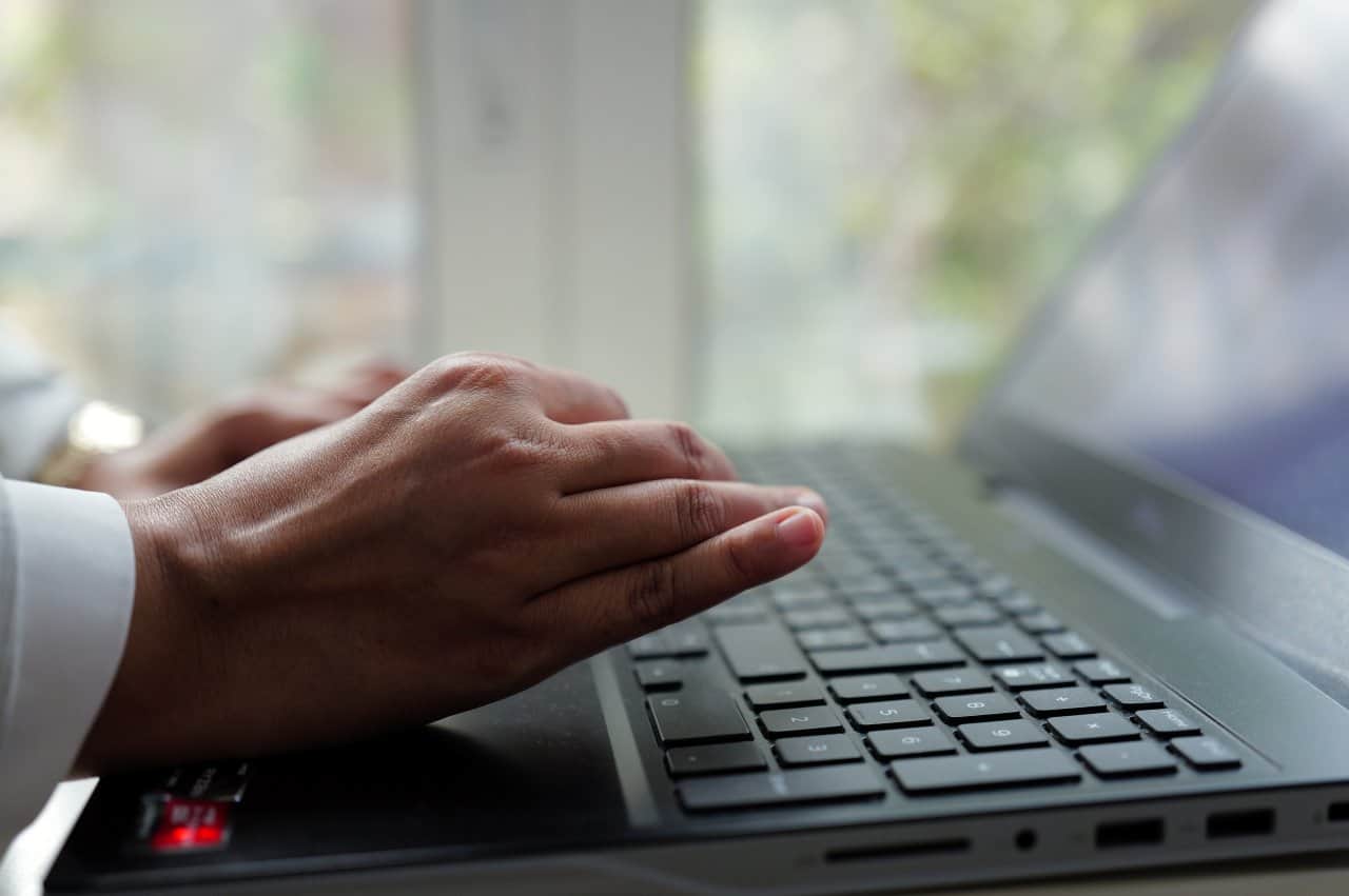 Nls Diagnostic Machine Operation Laptop Keyboard Typing Healthcare Professional - integrative healthcare treatment at Healers Clinic Dubai