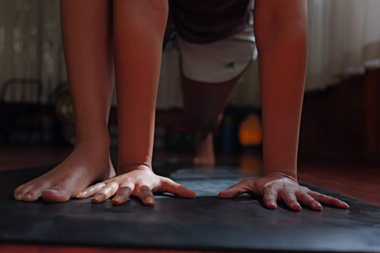 Yoga Downward Dog Plank Pose Practitioner Hands Feet Mat Strength - integrative healthcare treatment at Healers Clinic Dubai