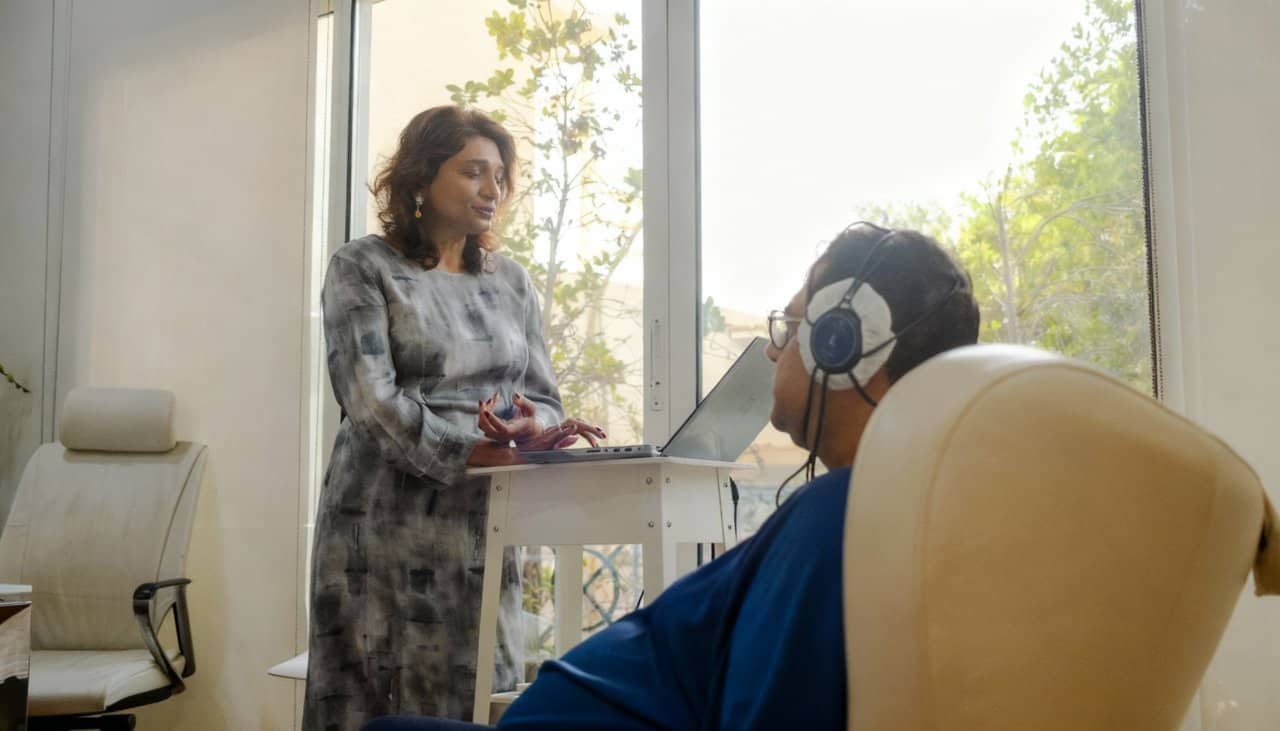 Nls Diagnostics Patient Experience Practitioner Laptop Headphones Scan Procedure - integrative healthcare treatment at Healers Clinic Dubai